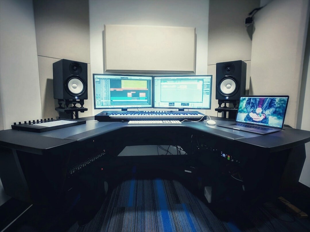 TV studio gallery room with vision mixer desk and preview monitors
